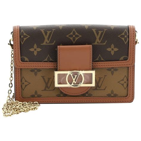 louis vuitton chain wallet purse|louis vuitton dauphine chain wallet.